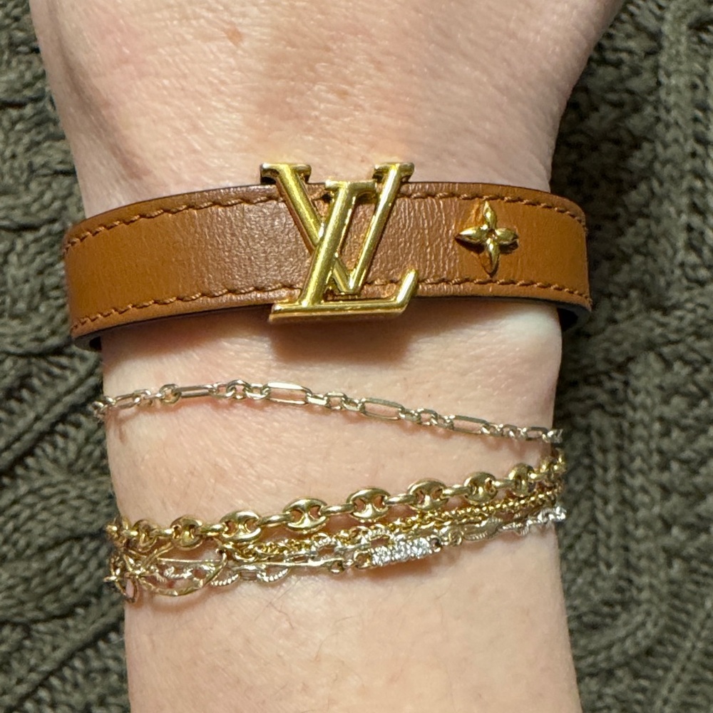 Brown Louis Vuitton leather bracelet with gold tone hardware